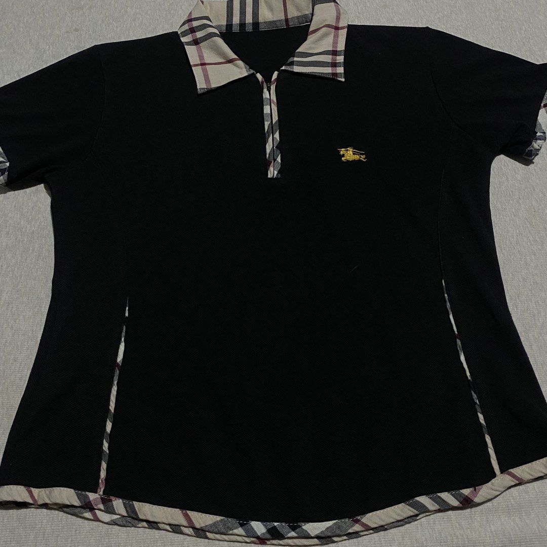 Burberry (Category: Shirts) located in Mabalacat. Submitted by stellargarments (Listing ID 1468979439, Image 3). Description: Length : 21 Width : 17-18 Condition : 9/10 Solid details embroidered logos mismong tela yung plaid Working qzip cut tags but super solid details! very comfy & smooth on skin need wash fresh from bale color may vary due to lighting.