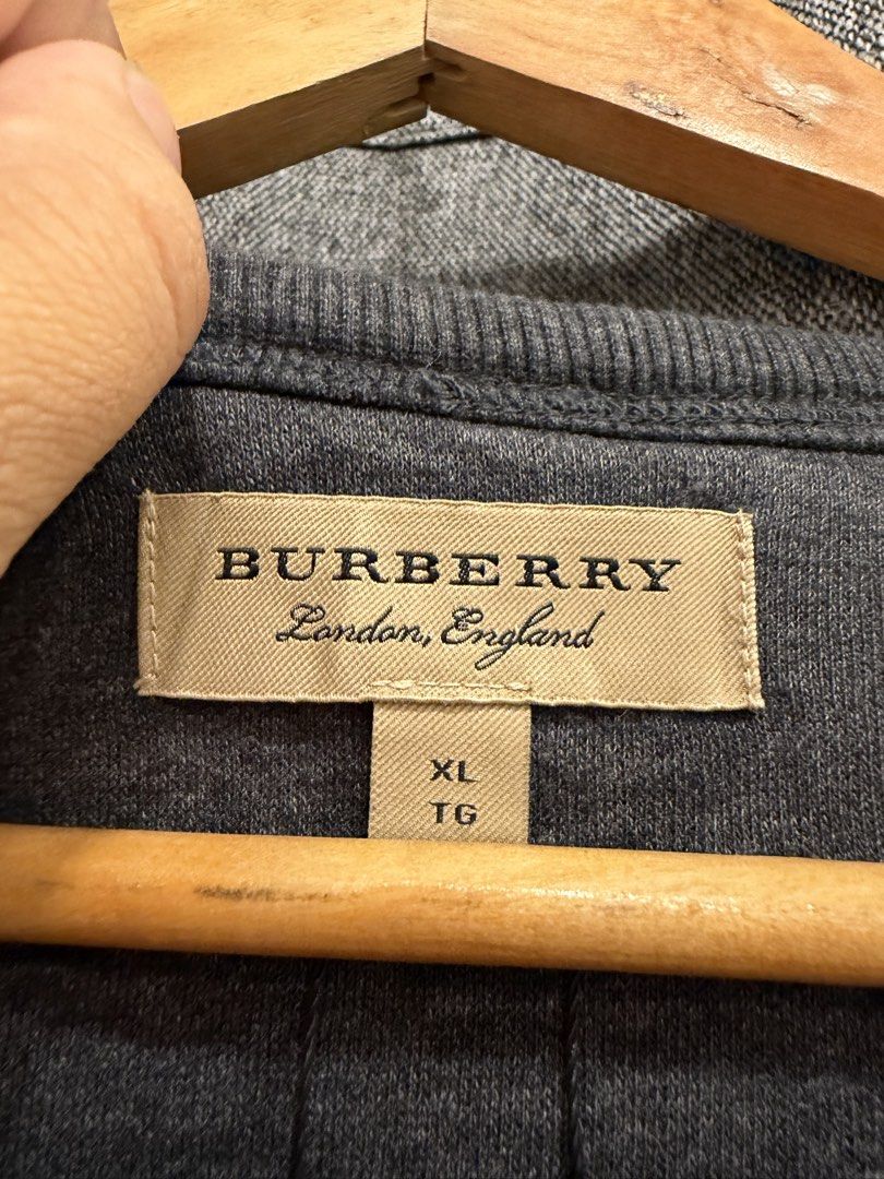 Burberry (Category: Longsleeves) located in Quezon City. Submitted by macleen17 (Listing ID 1469013637, Image 3). Description: Burberry Size L Excellent Condition Big Fish Design. burberry print in front Grey Color .