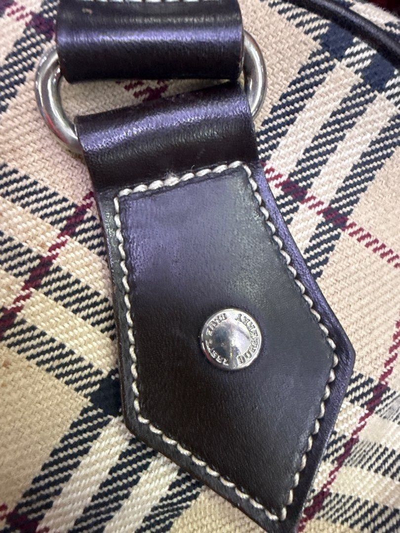 Burberry Blue Label Nova Check Handbag (Category: Luxury Bags & Wallets) located in Manila. Submitted by happywhale-0f64 (Listing ID 1469003482, Image 3). Description: - Authentic Burberry Blue Label handbag in iconic nova check pattern - Dark brown leather trim and dual top handles - Secure top zip closure with silver-tone branded hardware - Clean canvas body with interior Burberry London Blue Label tag - Compact size, ideal for everyday use.