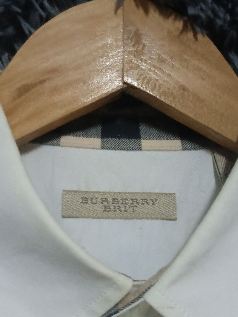 Burberry White Plaid Polo Longsleeve Button Down (Category: Activewear) located in Manila. Submitted by thrift_marvs (Listing ID 1469126347, Image 3). Description: Burberry White Plaid Polo Longsleeve Authentic Size Small Dimension 19.5 Width 28 Length No Issue Need Wash 980 plus shipping fee.