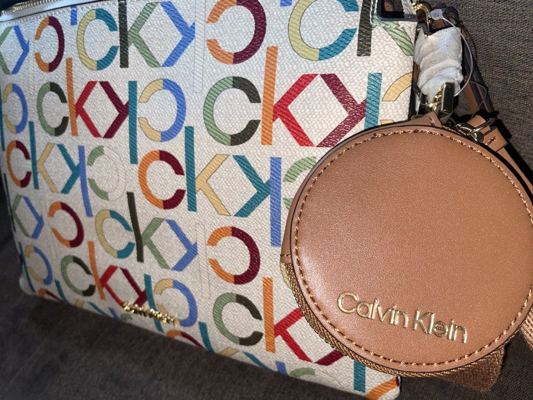 Calvin Klein Multicolor Monogram Crossbody Bag (Category: Shoulder Bags) located in Manila. Submitted by katieley_ (Listing ID 1469113143, Image 3). Description: Very rich tita vibes! You should buy this, the color is so alluring .