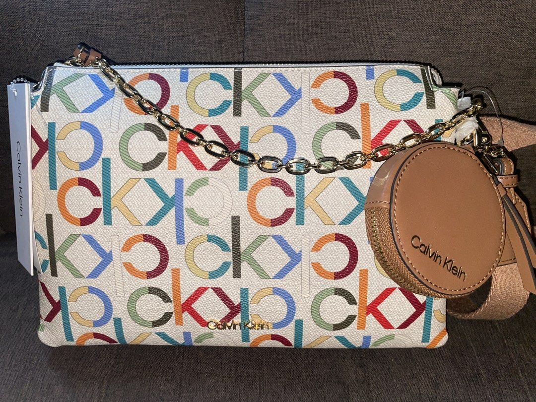 Calvin Klein Multicolor Monogram Crossbody Bag (Category: Shoulder Bags) located in Manila. Submitted by katieley_ (Listing ID 1469113143, Image 1). Description: Very rich tita vibes! You should buy this, the color is so alluring .
