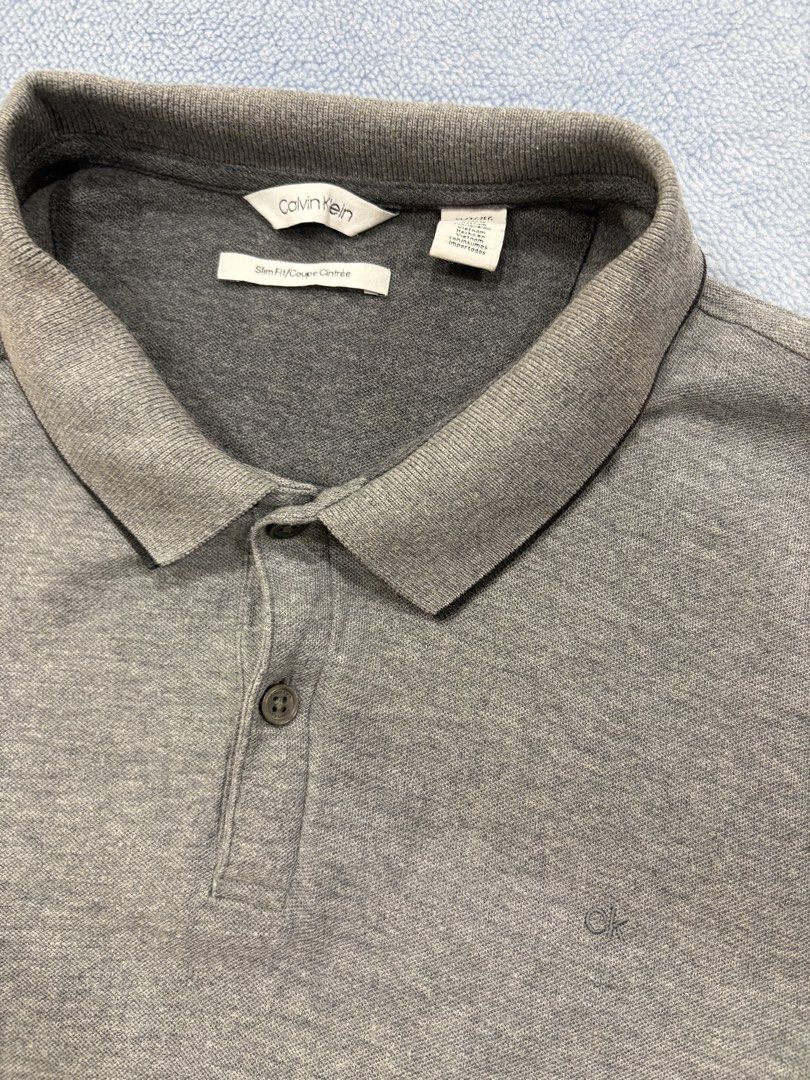 Calvin Klein Slim Fit Polo (Category: Tshirts & Polo Shirts ) located in Alburquerque. Submitted by ukay_ni_edgar (Listing ID 1469022221, Image 2). Description: Clean, classic, and effortlessly stylish. A wardrobe essential for that minimalist look..
