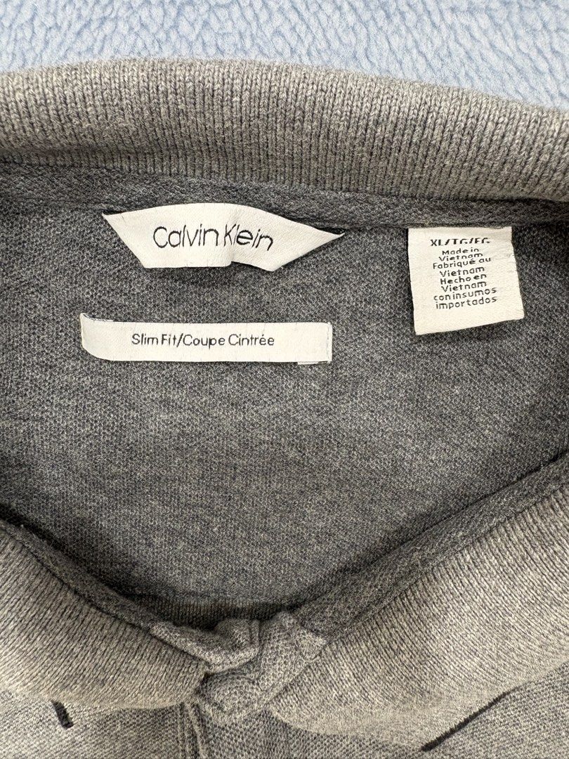Calvin Klein Slim Fit Polo (Category: Tshirts & Polo Shirts ) located in Alburquerque. Submitted by ukay_ni_edgar (Listing ID 1469022221, Image 3). Description: Clean, classic, and effortlessly stylish. A wardrobe essential for that minimalist look..
