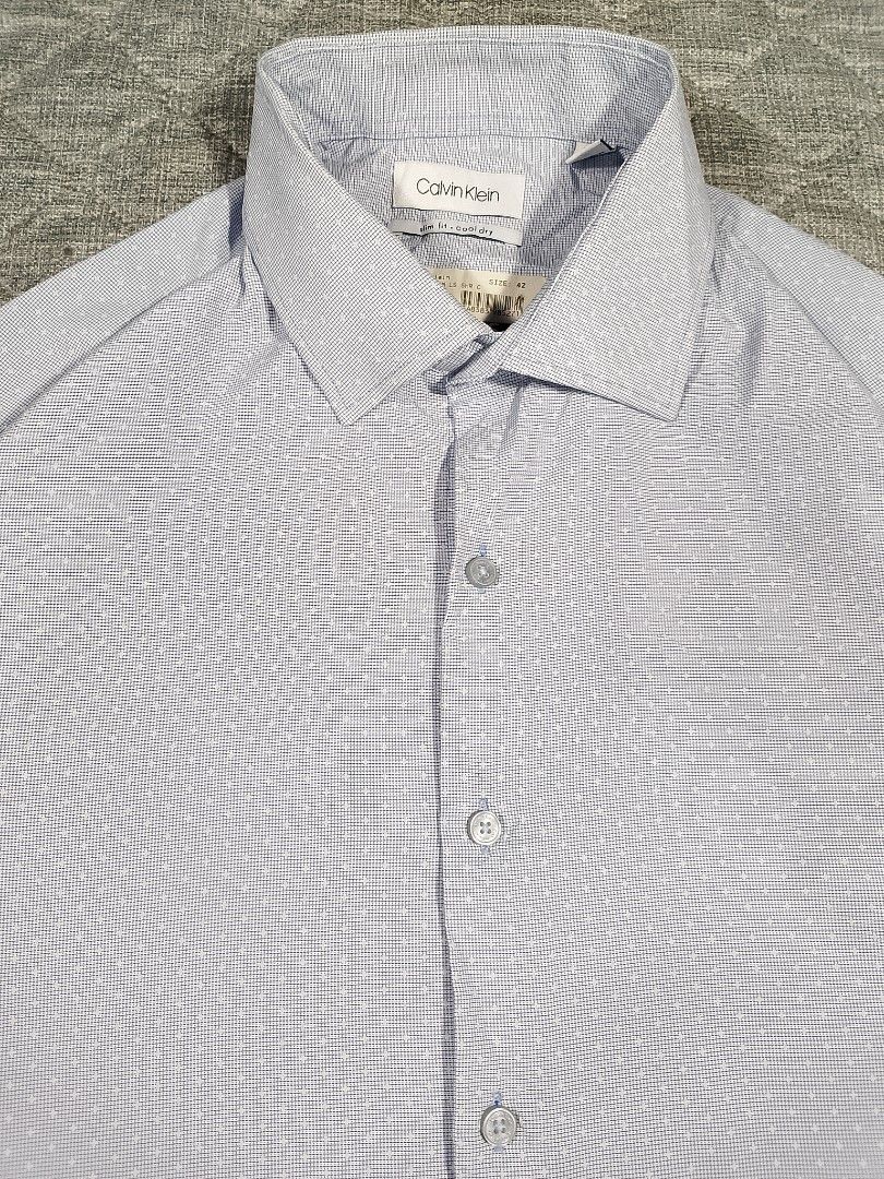 Calvin Klein slimfit cool dry button down long sleeves shirt micro patterns (Category: Formal Shirts) located in Cadiz. Submitted by comradstuff (Listing ID 1468934694, Image 2). Description: Calvin Klein slimfit cool dry button down long sleeves shirt micro patterns w 22.5" l 29.5".