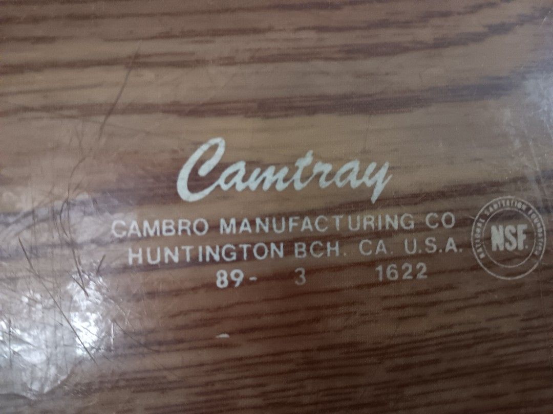 Cambro Camtray Wood Grain Serving Tray (Category: Dinnerware & Cutlery) located in Las Pinas. Submitted by jesus1smysavi0r (Listing ID 1469014899, Image 1). Description: - Authentic Cambro Camtray made in Huntington Beach, USA - Classic wood grain pattern for retro cafe or diner aesthetics - Durable fiberglass construction, NSF certified for commercial use - Raised edges help prevent spills - Versatile for food service or practical home organizin