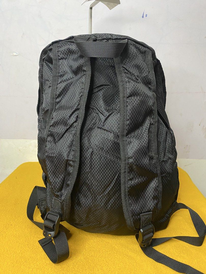 Camel Black Ripstop Backpack with Front Pocket (Category: Backpacks) located in Manila. Submitted by onfleekapparelph (Listing ID 1469068561, Image 3). Description: - Brand new with original red tags attached - Made from durable black ripstop material with a stylish small diamond grid pattern - Large main compartment for everyday essentials - Front zipped pocket featuring the signature white Camel logo and camel icon - Comfortable adjustable shou