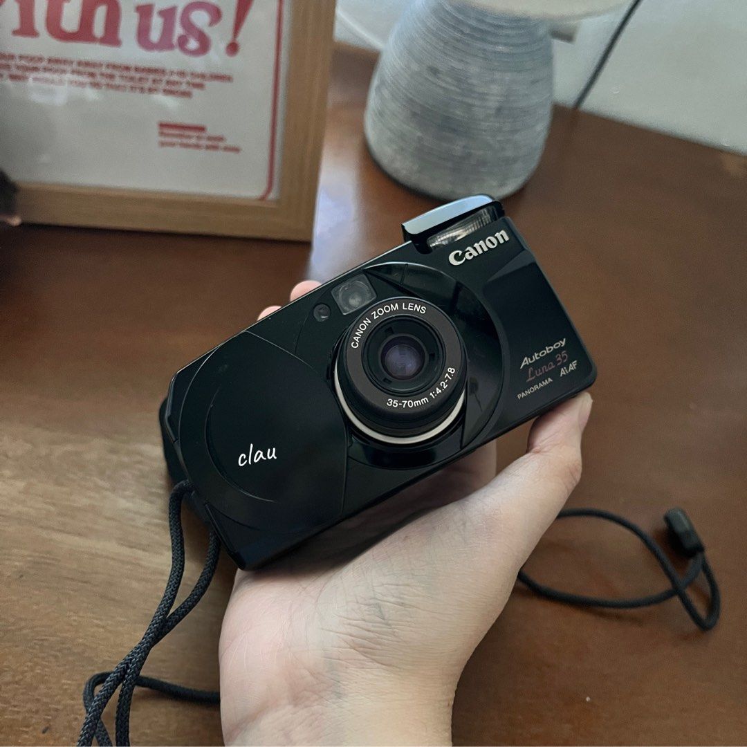 Cano Autoboy Luna 35 (Category: Cameras) located in Muntinlupa City. Submitted by on.repeeat (Listing ID 1469053553, Image 1). Description: Canon autoboy Luna 35 🏷️3499 (nego) Autofocus: 3-point AiAF (Artificial Intelligence Autofocus) system with a range from 0.6 m to infinity. Flash Modes: Auto, flash-on, flash-off, and red-eye slow sync. Only issue is di na angat flash fully need ipitan ng paper — please see vid Unit, battery, pouch, strap as