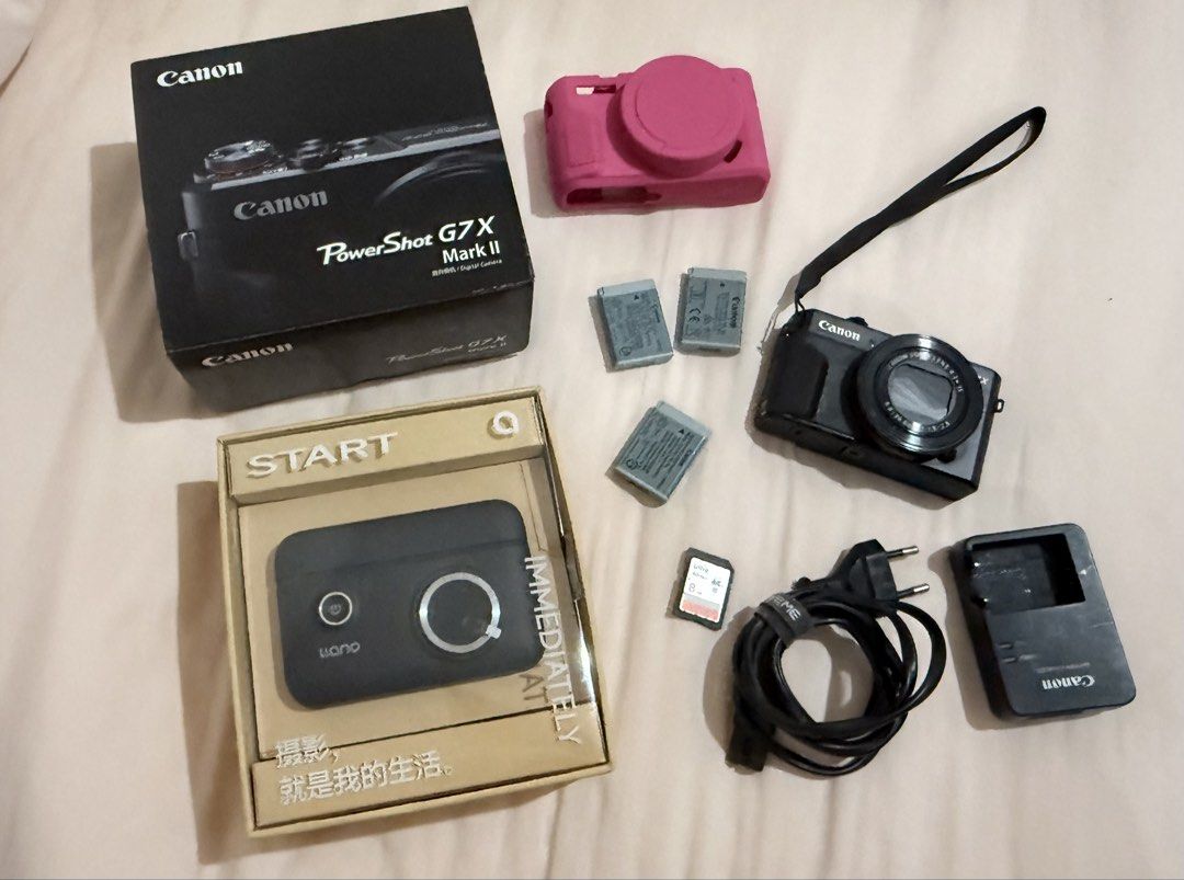 Canon PowerShot G7 X Mark II Camera Bundle (Preloved) (Category: Cameras) located in Caloocan City. Submitted by reizbuenaventura (Listing ID 1469033825, Image 1). Description: For Sale: Canon G7X Mark II (PRELOVED) Inclusion: Camera Unit Camera Strap Original Charger 3 Original Canon Batteries 1 SD Card 8 GB Sandisk Silicone Case Box and Manual Llano Battery Charger All buttons are working. Flash is working. New screen tempered glass installed. 