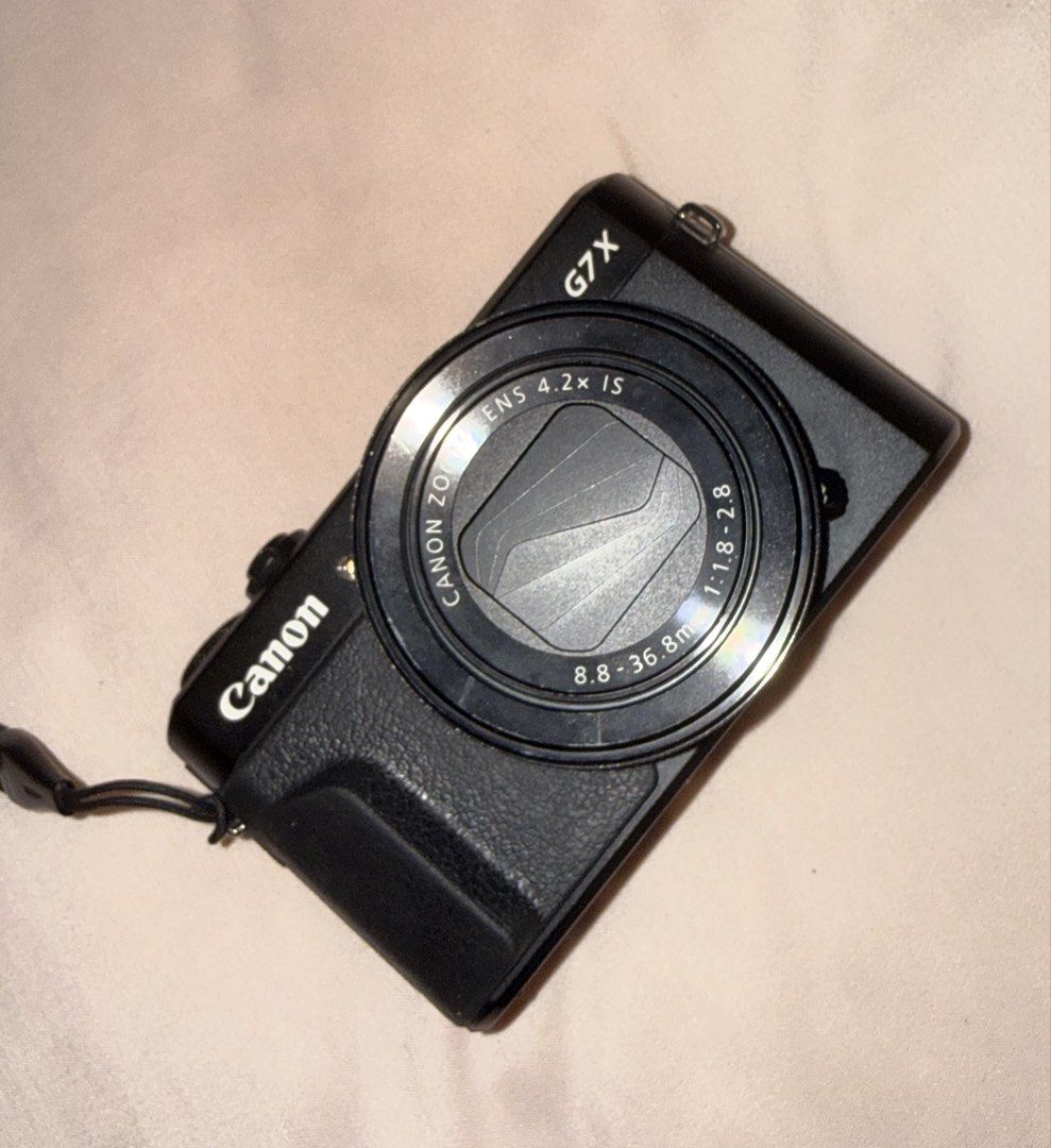Canon PowerShot G7 X Mark II Camera Bundle (Preloved) (Category: Cameras) located in Caloocan City. Submitted by reizbuenaventura (Listing ID 1469033825, Image 2). Description: For Sale: Canon G7X Mark II (PRELOVED) Inclusion: Camera Unit Camera Strap Original Charger 3 Original Canon Batteries 1 SD Card 8 GB Sandisk Silicone Case Box and Manual Llano Battery Charger All buttons are working. Flash is working. New screen tempered glass installed. 