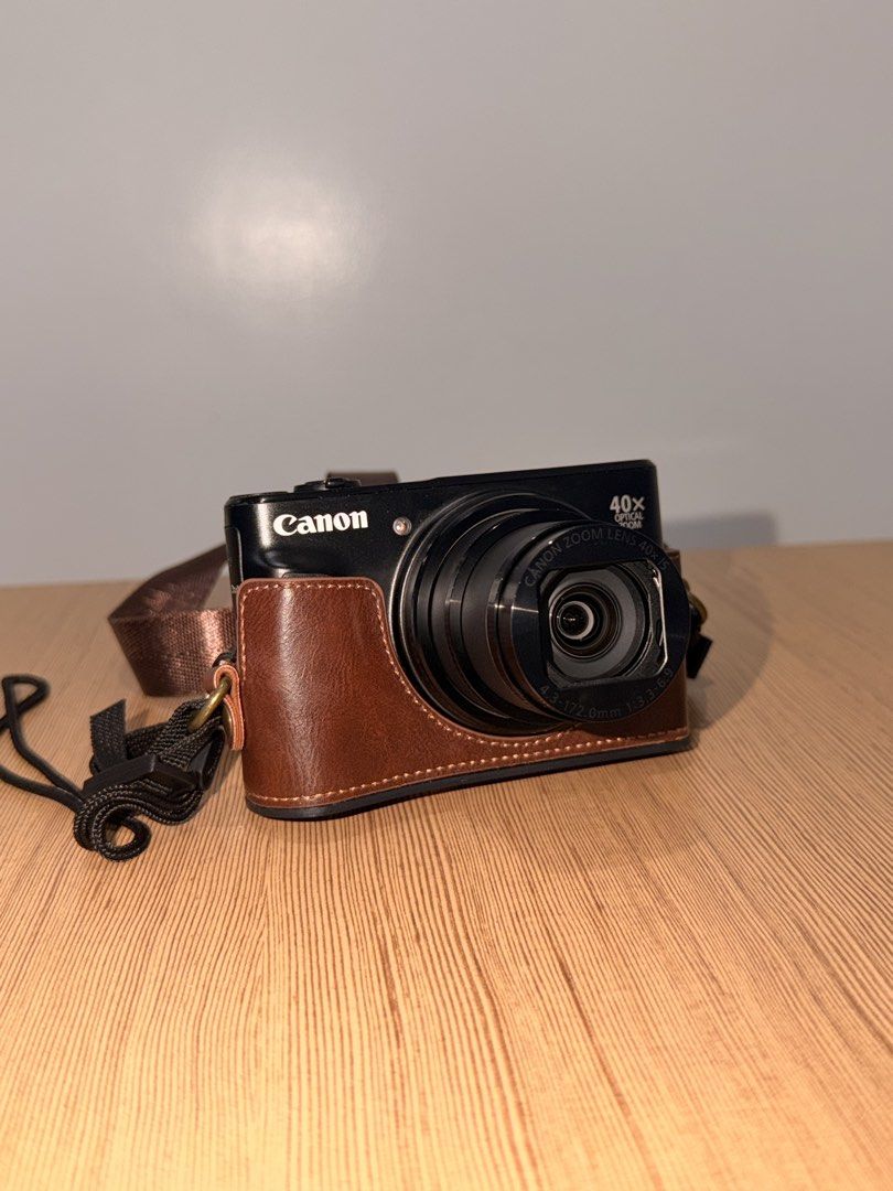 Canon PowerShot SX740 HS Digital Camera (Category: Cameras) located in Balanga. Submitted by nikkicells (Listing ID 1468994355, Image 2). Description: Canon PowerShot SX740 HS Compact Digital Camera (Black) - Condition: Brand new. Wala pang 1 month sa akin. - Inclusions: Original box, warranty card, plus a stylish brown leather-style protective case and matching shoulder strap worth 400, with screen protector na, + Wasabi 2-pack battery kit (2 sp