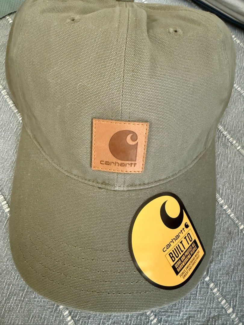 Carousell Carhartt Force Built To Cap Hat (Category: Caps & Hats) located in Pasay City. Submitted by ccpetitte (Listing ID 1469109815, Image 1). Description: Carhartt Force hat with original yellow sticker attached on the brim. Classic Carhartt square leather patch centered on the front crown. Adjustable back strap. Available in olive green, grey, brown, and black colorways. Sturdy canvas material construction with ventilation eyelets on top..