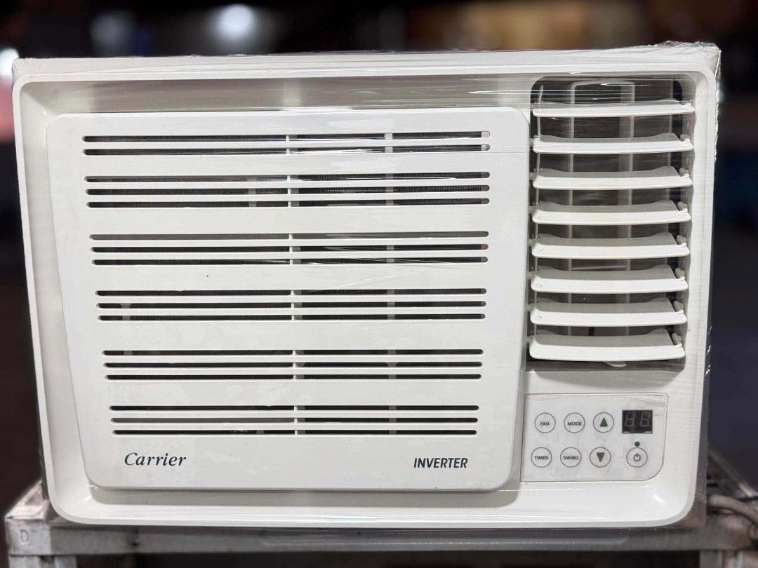 Carrier Inverter Window Type Air Conditioner (Category: Air Conditioning and Heating) located in Manila. Submitted by jamaya09 (Listing ID 1469058260, Image 1). Description: - Brand: Carrier Window Type Aircon - Technology: Inverter (Energy-saving) - Color & Finish: Clean white with digital display panel - Controls: Front-facing control buttons & adjustable right-side louvers - Condition: Brand new, still wrapped in protective plastic film.