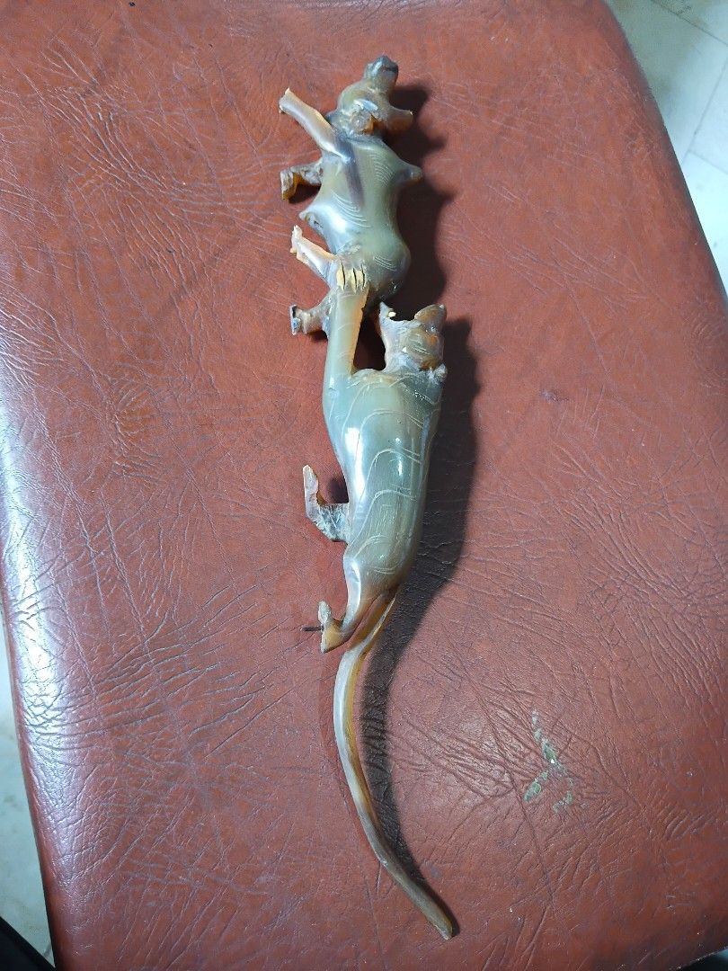 Carved horn tiger, playing ( no base) (Category: Vintage Collectibles) located in Paranaque City. Submitted by 4thestate.surplusan (Listing ID 1468970322, Image 1). Description: vintage carved horn tiger, playing , fighting. see photos.
