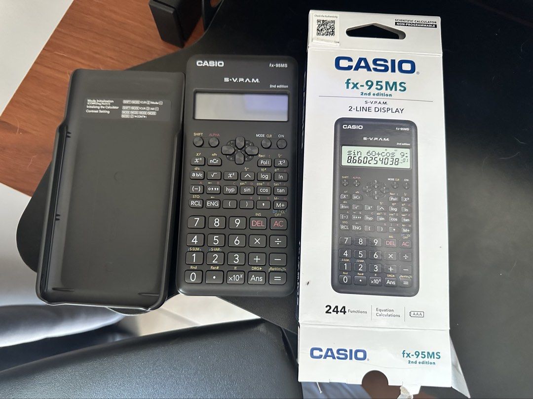 Casio fx-95MS 2nd Edition Scientific Calculator (Category: Office & Business Technology) located in Valenzuela. Submitted by brypreloved_ (Listing ID 1469122499, Image 1). Description: - Model: Casio fx-95MS 2nd Edition (Non-programmable) - Functions: 244 built-in functions with a clear 2-line display - Condition: Fully working, clean keys, and scratch-free screen - Inclusions: Protective hard case and original retail packaging box.