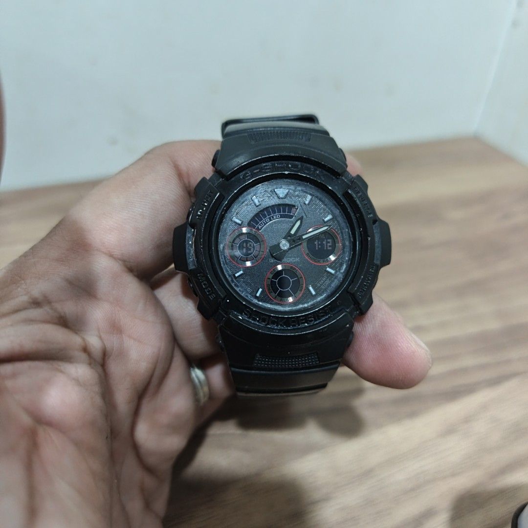 Casio G-Shock Black Digital Analog Resin Strap Watch (Category: Men's Watches) located in Manila. Submitted by narju1234 (Listing ID 1468998580, Image 2). Description: - Brand: Casio G-Shock - Color: Classic black with striking orange accents - Display: Analog-digital round dial with multiple sub-dials - Build: Legendary shock-resistant resin construction with metal buckle - Movement: Reliable battery-operated quartz - Condition: Visible wear on 