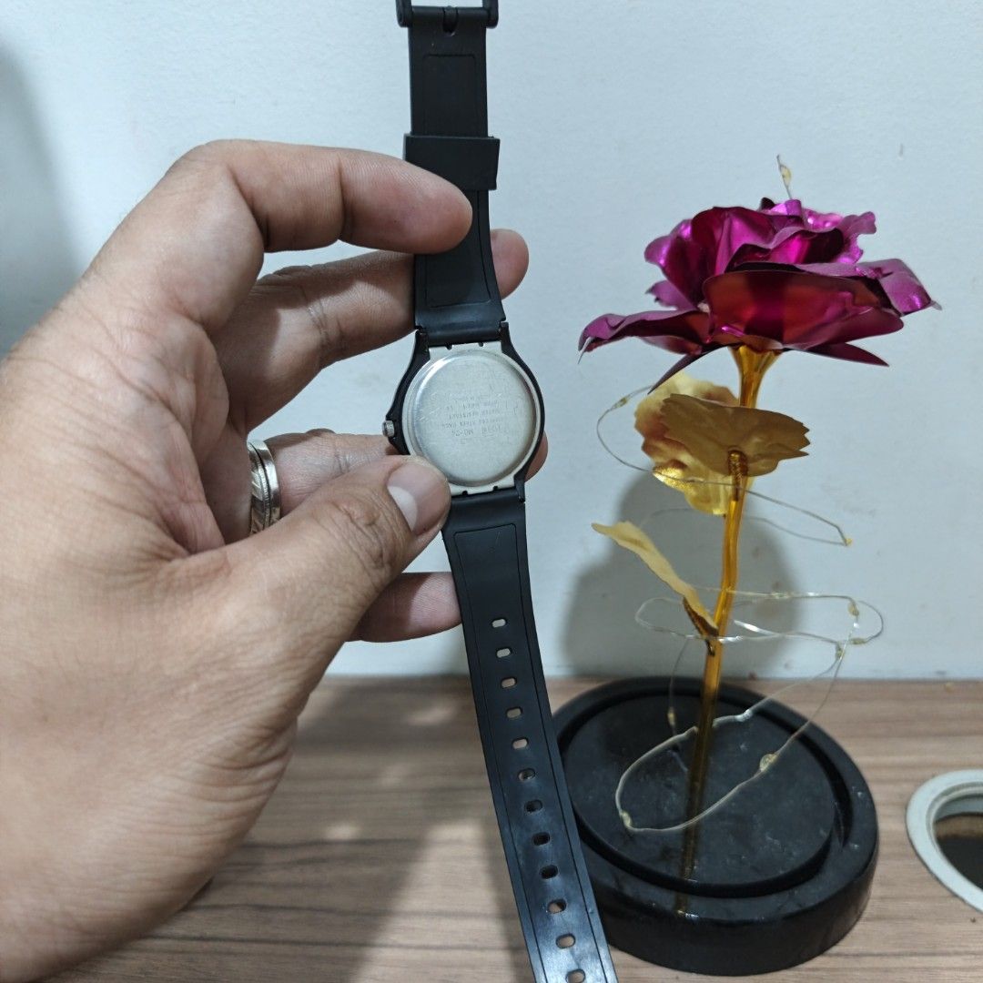 Casio Quartz Black Analog Watch MQ-24 (Category: Men's Watches) located in Manila. Submitted by narju1234 (Listing ID 1468999528, Image 3). Description: - Brand: Casio (Model MQ-24) - Movement: Quartz, battery-powered (runs well) - Design: All-black body with elegant gold hands and hour markers - Strap: Lightweight resin strap with secure buckle closure (no cracks) - Condition: Minor scuffs on the crystal face from normal wear - Features: Water-r