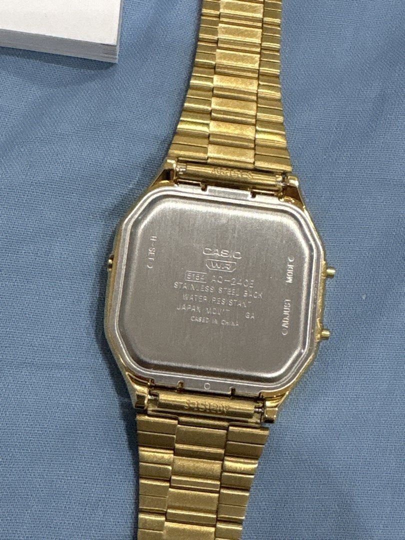 Casio Vintage AQ-240E watch (Category: Women's Watches) located in Cavite. Submitted by stuffsheloved (Listing ID 1469031608, Image 2). Description: RFS: it was just given to me but I don’t really wear gold. Im a silver watch person. Wore this only twice - Model: Casio Vintage AQ-240EG-9ADF (Module 5154) - Design: Classic gold finish with analog and digital display - Movement: Fully functional dual time quartz movement - Material: Durable stainle