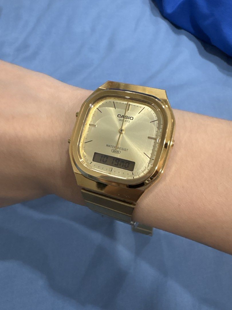 Casio Vintage AQ-240E watch (Category: Women's Watches) located in Cavite. Submitted by stuffsheloved (Listing ID 1469031608, Image 3). Description: RFS: it was just given to me but I don’t really wear gold. Im a silver watch person. Wore this only twice - Model: Casio Vintage AQ-240EG-9ADF (Module 5154) - Design: Classic gold finish with analog and digital display - Movement: Fully functional dual time quartz movement - Material: Durable stainle