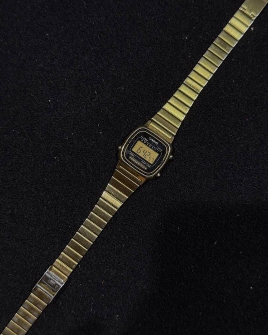 Casio Vintage Gold Digital Watch (Category: Women's Watches) located in Quezon City. Submitted by itsbiancag (Listing ID 1469085921, Image 2). Description: - Gold Tone Stainless Steel Band - Adjustable Clasp - Has scratches and discoloration but unnoticeable and still in nice and working condition! - Just replaced with original batteries.