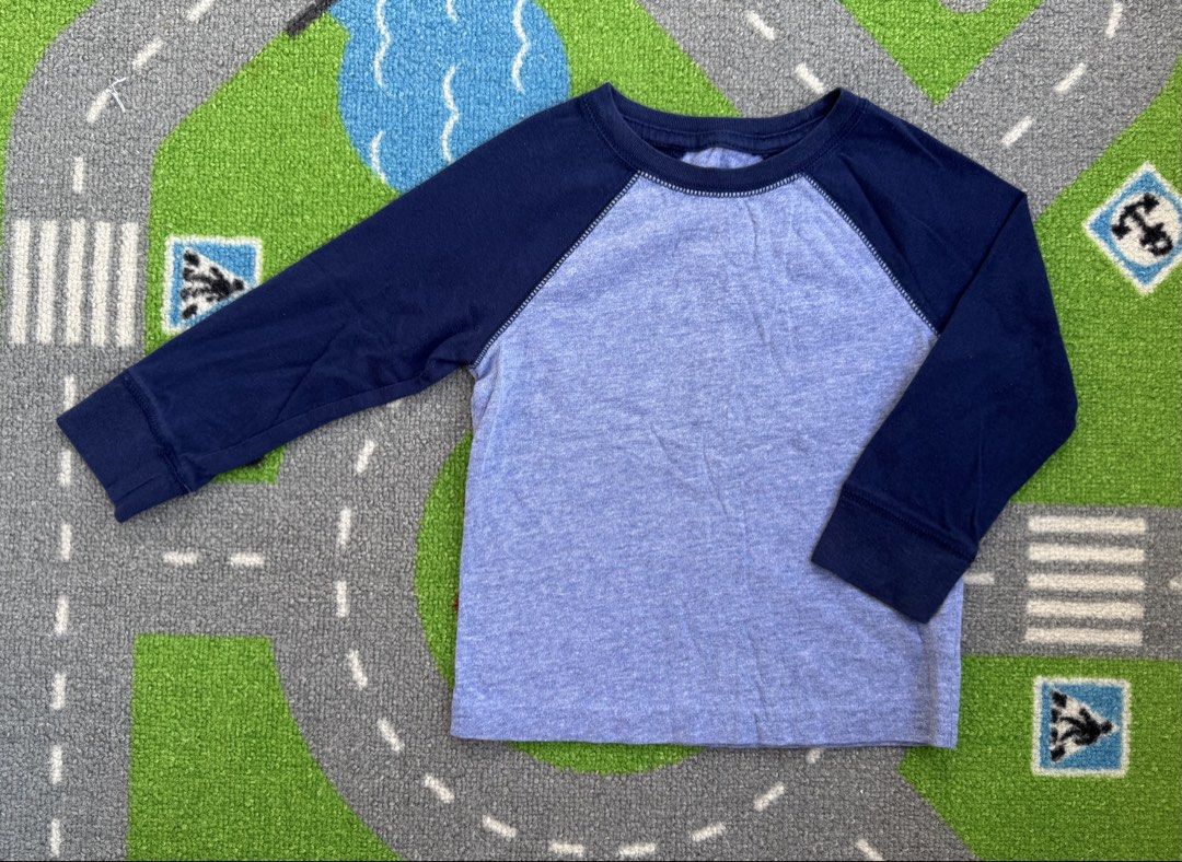 Cat & Jack Long Sleeve Shirt (Category: Babies & Kids Fashion) located in Rizal. Submitted by preloovved (Listing ID 1469045786, Image 1). Description: Comfortable blue heathered kids' top with dark blue raglan long sleeves, crew neck, and soft cotton material. Perfect for everyday wear! Preloved, 18mos Meet-up only in GB1 San Mateo, Rizal Shipping fee c/o buyer. Tres Marias or J&T express Payment to be sent to me via BPI/BDO/GCASH only. 😁 C#.