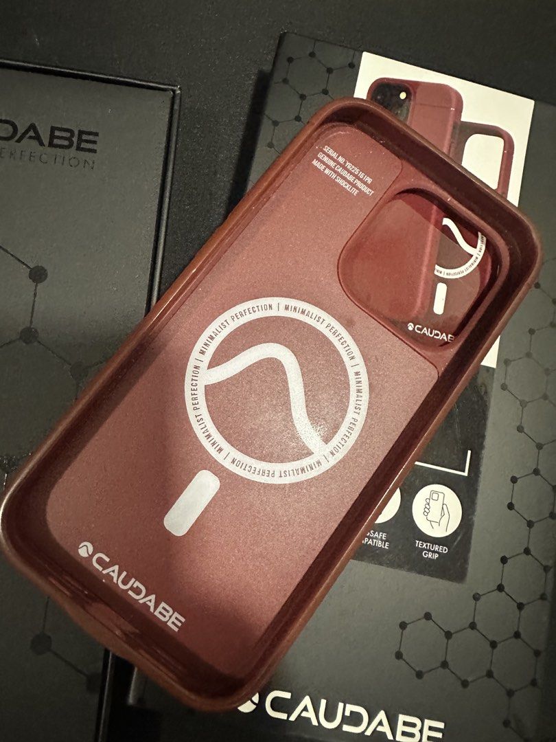 Caudabe iphone 14 pro case red (Category: Cases & Sleeves) located in Quezon City. Submitted by dlsy12 (Listing ID 1469010976, Image 2). Description: - Brand: Caudabe - Model: Sheath for iPhone 14 Pro - Color: Crimson Red - Features: MagSafe compatible, textured grip for anti-slip, ultra slim design - Protection: Drop tested up to 2m / 6.6 ft with ShockLite material - Condition: Well-maintained and ready to use.