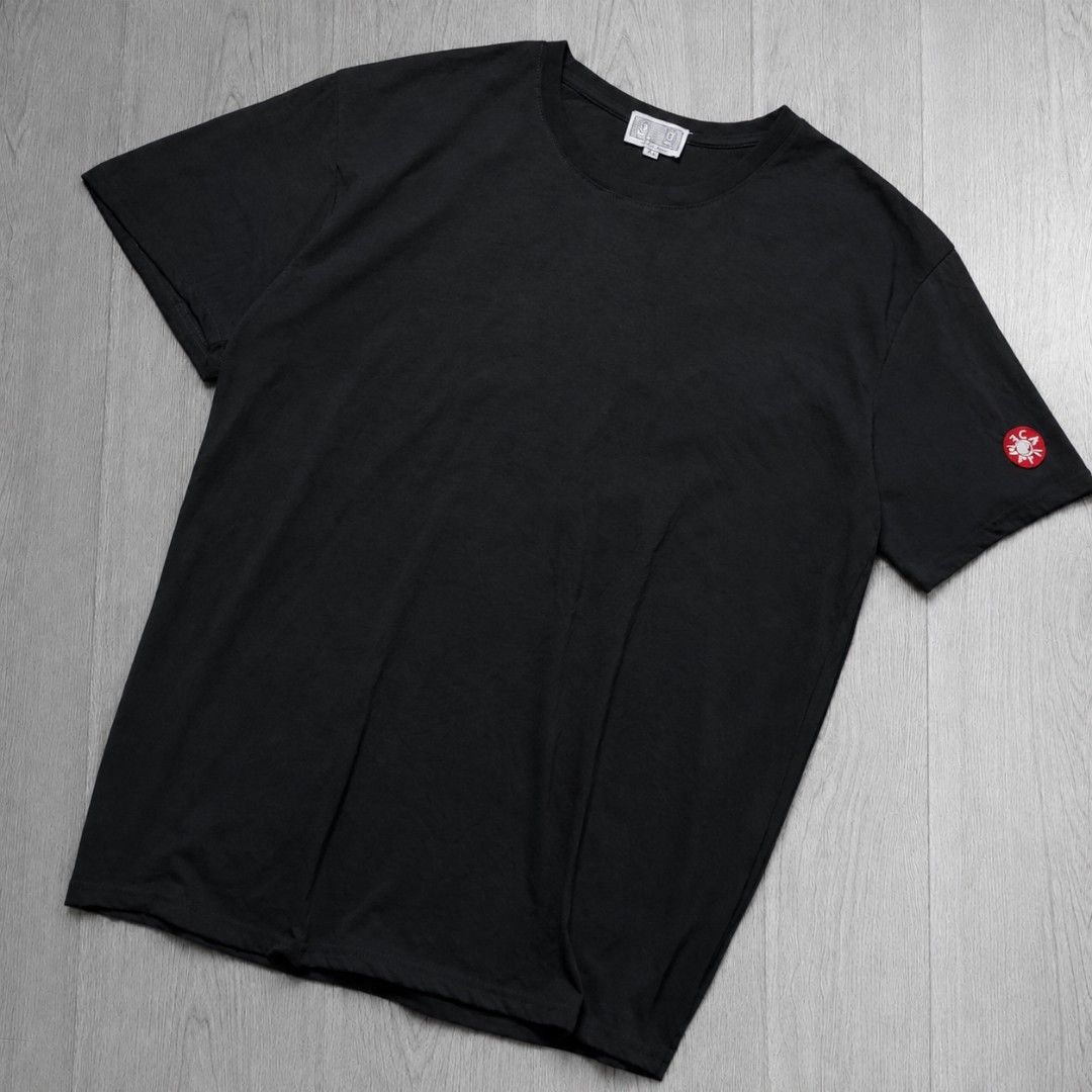 Cav Empt Japan Tshirt (Category: Tshirts & Polo Shirts ) located in Taguig. Submitted by althriftdailyloots94 (Listing ID 1466267674, Image 1). Description: Cav Empt t-shirt in dark grey. Short sleeves, round neck. Rubber C.E logo patch on the left sleeve in red and white. White brand tag stitched at the inside collar. Made in Japan tag attached below collar. Size XL label underneath. Clean stitching throughout..