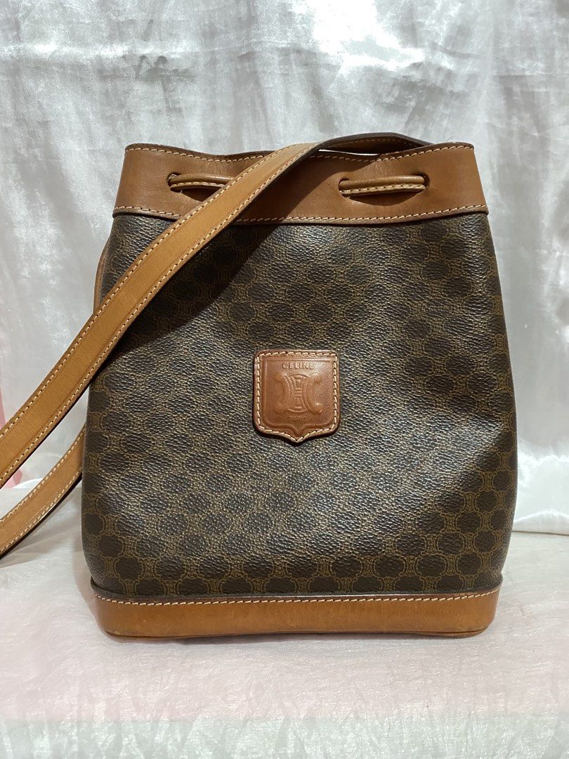Celine Macadam Brown Bucket Bag (Category: Luxury Bags & Wallets) located in Taguig. Submitted by nekosan_ (Listing ID 1468990900, Image 1). Description: Original may pouch/wallet May minor flaws rubs Small size.