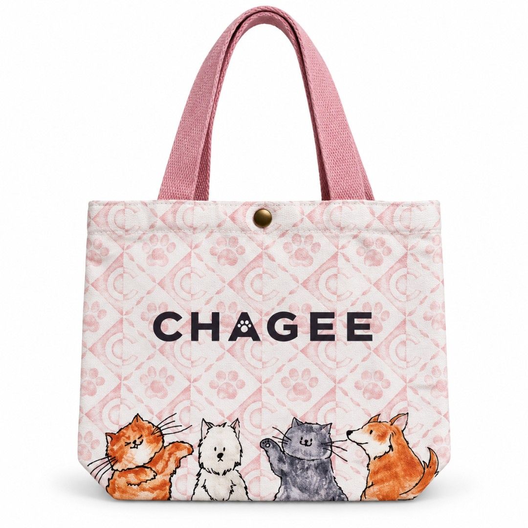 CHAGEE Pet Series Canvas Tote Bag (Cat & Dog Pattern) (Category: Homes & Other Pet Accessories) located in Pasig City. Submitted by swipeandpicks (Listing ID 1469085650, Image 1). Description: •Color: Pastel Pink base pattern with vibrant watercolor illustrations of cats and dogs, accented by soft blush pink woven cotton straps. •Material: Premium thick canvas / structured cotton blend with a secure snap-button closure on top. Features a water-re
