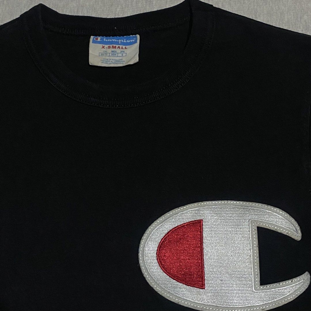 Champion Big Patch XS (Category: Shirts) located in Mabalacat. Submitted by stellargarments (Listing ID 1468978680, Image 2). Description: Masikip pa neck! Length : 25 Width : 15.5 Condition : 9/10 Sobrang laki ng C patch logo sa front Embroidered patch all logos Medjo makapal pagka cotton very comfy & smooth on skin need wash fresh from bale color may vary due to lighting.