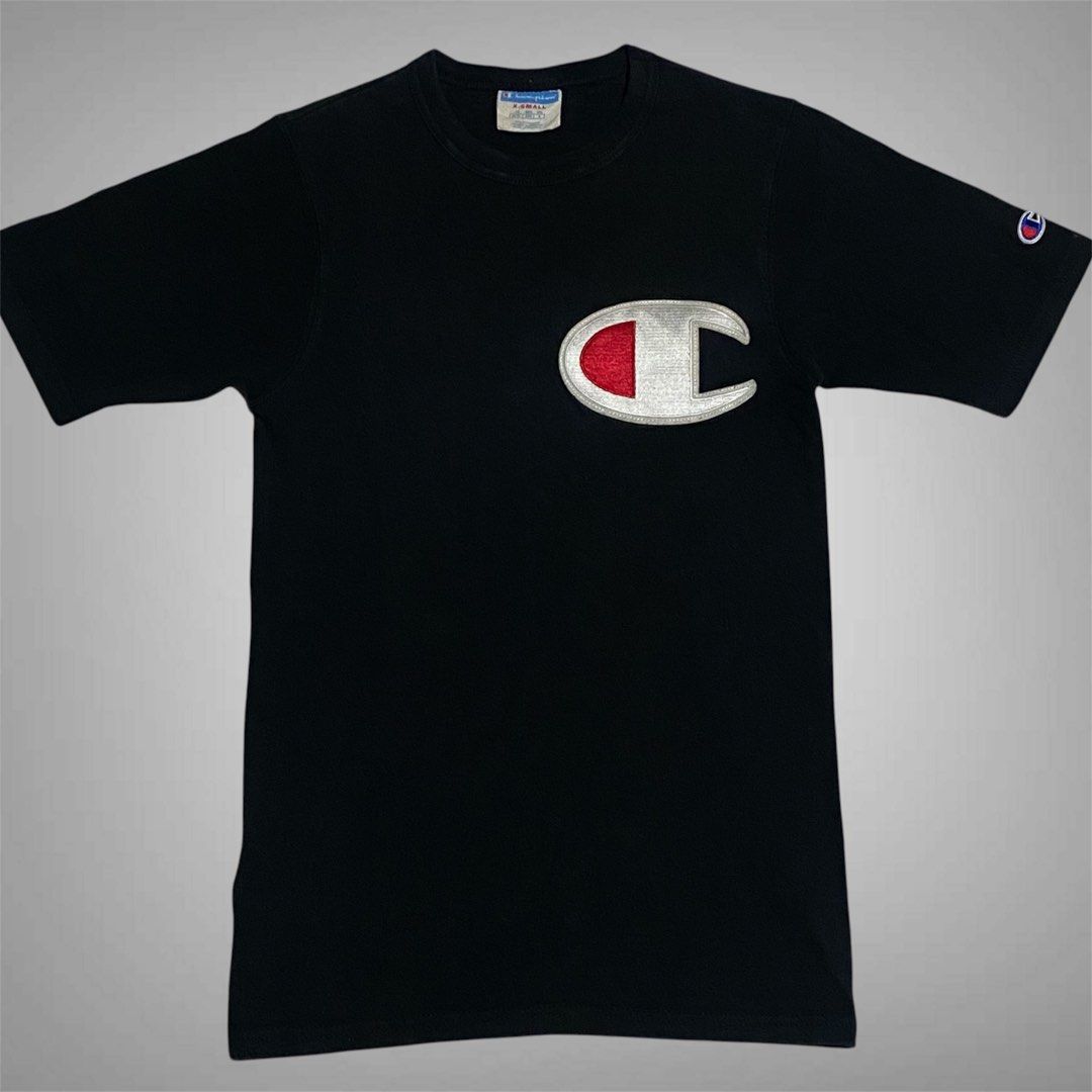 Champion Big Patch XS (Category: Shirts) located in Mabalacat. Submitted by stellargarments (Listing ID 1468978680, Image 1). Description: Masikip pa neck! Length : 25 Width : 15.5 Condition : 9/10 Sobrang laki ng C patch logo sa front Embroidered patch all logos Medjo makapal pagka cotton very comfy & smooth on skin need wash fresh from bale color may vary due to lighting.