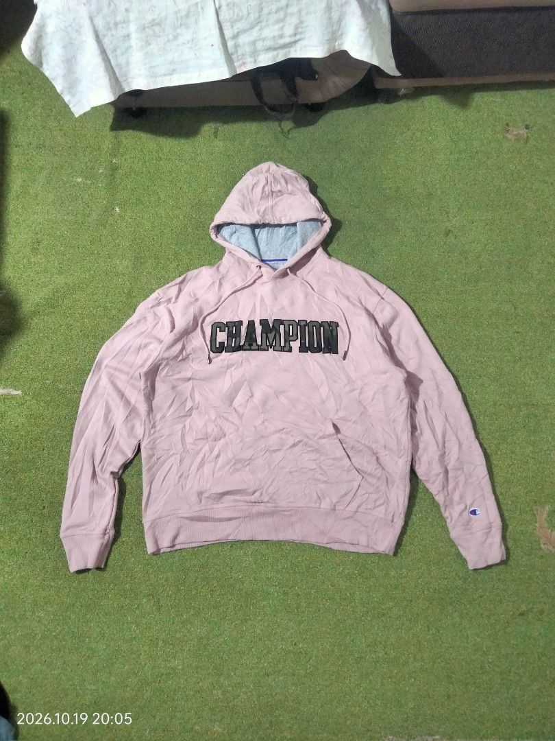 Champion pink hoodie (Category: Coats, Jackets and Outerwear) located in Caloocan City. Submitted by haruconcep52476 (Listing ID 1469074491, Image 1). Description: Dimensions W23×L27 Good condition Color rate 9 Issue need wash Fresh from bale.