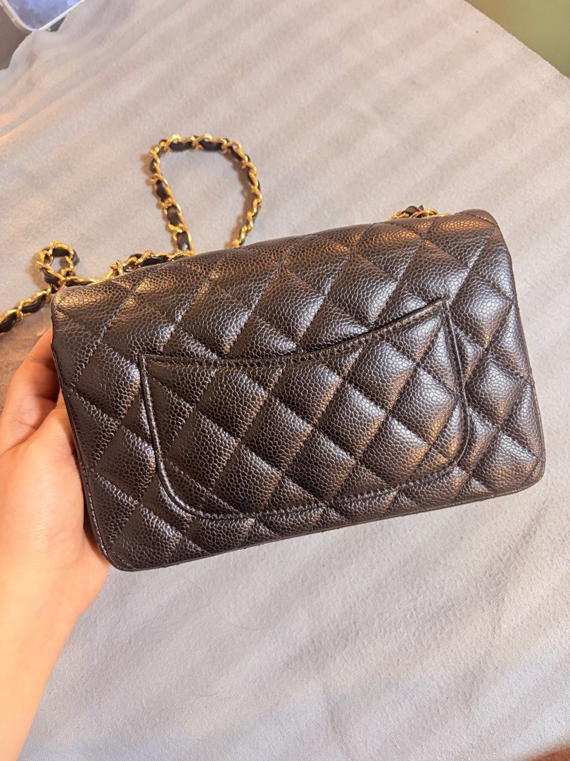 Chanel Classic Flap Caviar mini rectangle (Category: Cross-body Bags) located in Manila. Submitted by mokeybizz (Listing ID 1469038710, Image 3). Description: - Chanel shoulder bag in classic black caviar leather - Luxurious gold-tone hardware with iconic interlocking CC turn-lock closure - Timeless all-over quilted pattern with a convenient rear slip pocket - Elegant interwoven leather and chain strap - Structured side gussets and flap top desig
