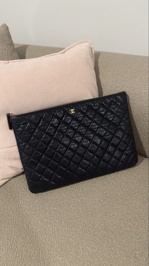 Chanel Laptop Bag/Pouch Bag (Category: Clutches) located in Pasig City. Submitted by katttts (Listing ID 1469089812, Image 1). Description: With Box, Dustbag and Card Caviar.