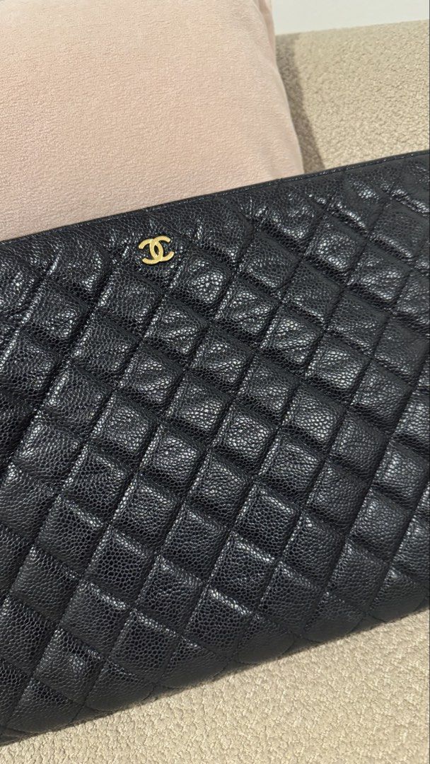 Chanel Laptop Bag/Pouch Bag (Category: Clutches) located in Pasig City. Submitted by katttts (Listing ID 1469089812, Image 2). Description: With Box, Dustbag and Card Caviar.
