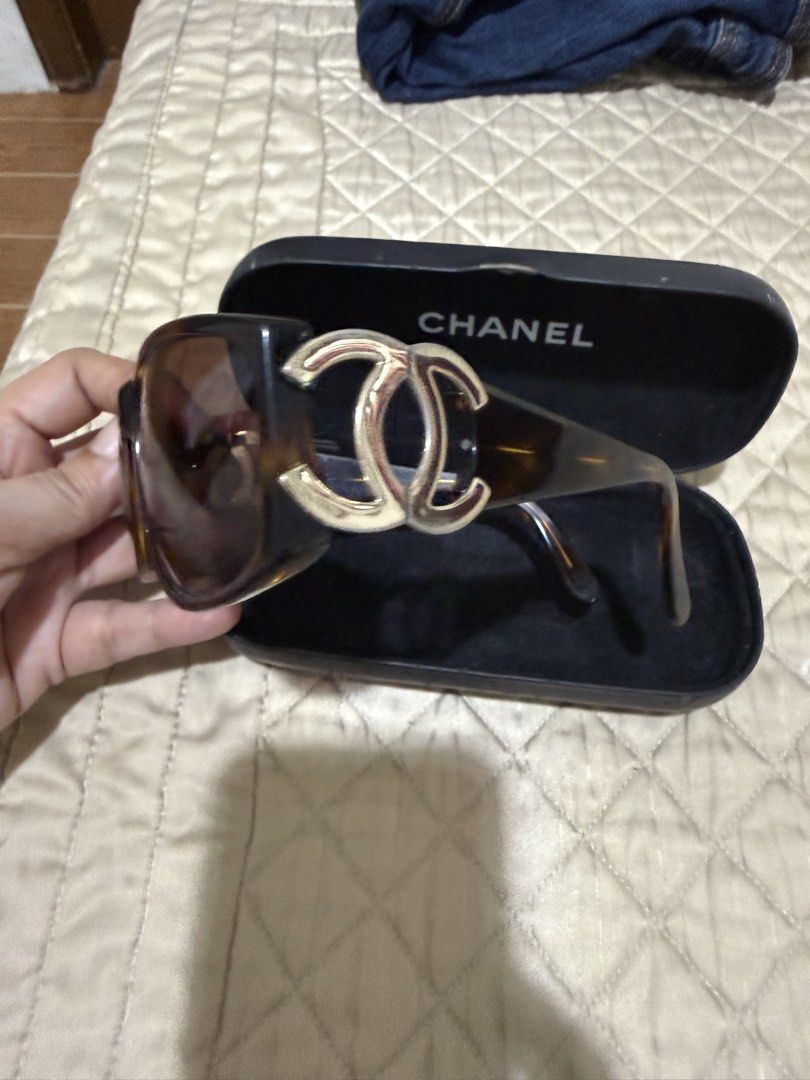 Chanel Tortoiseshell Sunglasses with CC Logo (Category: Sunglasses & Eyewear) located in Quezon City. Submitted by aaathrifts (Listing ID 1468969227, Image 3). Description: - Brand: Chanel - Style: Classic square tortoiseshell frames with brown tinted lenses - Details: Large silver CC logo hardware on temples - Condition: Clean lenses, sturdy hinges, great everyday luxury piece - Inclusions: Comes with original Chanel hard case -fit for small fra