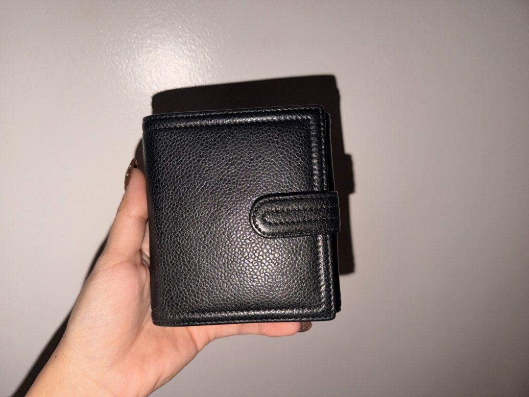 Chanel Wallet (Category: Luxury Bags & Wallets) located in Cainta. Submitted by jeon.jkookie (Listing ID 1469101316, Image 3). Description: Bought from an online shop Holo intact With cabinet smell (bought it like this) Used once only Rfs: I have too many wallets.