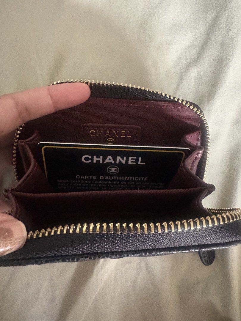 Chanel Wallet (Category: Wallets & Card holders) located in Manila. Submitted by mndoxajc (Listing ID 1469158489, Image 3). Description: - Authentic Chanel zip coin purse - Luxurious black quilted caviar leather - Elegant gold-tone hardware with iconic interlocking CC logo - Burgundy fabric-lined interior with multiple compartments - Compact size, fits easily into mini bags or pockets - Includes authenticity card.