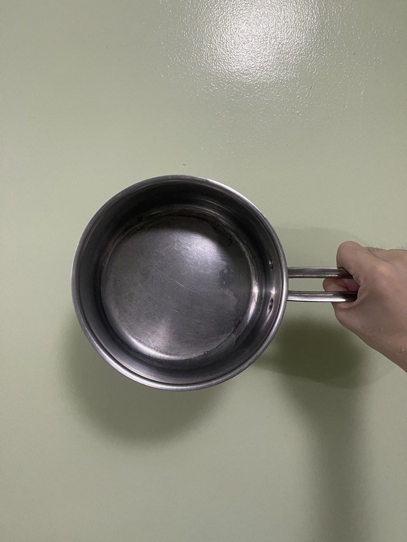 Chef's Gallery Stainless Steel Saucepan (Category: Cookware & Accessories) located in Manila. Submitted by pasaybestfinds (Listing ID 1469069908, Image 2). Description: Chef's Gallery stainless steel saucepan. Features a sturdy handle and round rim. Inner surface shows normal wear with some scratches and stains from previous cooking use. Exterior has the brand logo printed clearly on the side. Solid metal construction, good for daily meal prep..