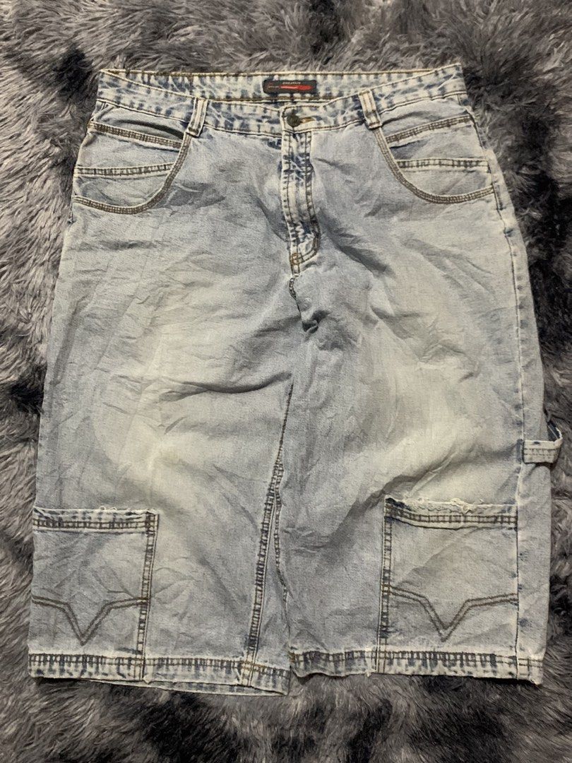 Chieftain Light Blue Denim Carpenter shorts size 34.5 (Category: Shorts) located in Cebu City. Submitted by johnbagzz (Listing ID 1469057278, Image 1). Description: - Brand: Chieftain - Style: Light wash denim cargo shorts for casual streetwear - Fit: Relaxed fit through the leg with a classic denim waistband and button closure - Features: Multiple utility pockets on the sides and back - Quality: Sturdy stitching with a branded tag on the inner w
