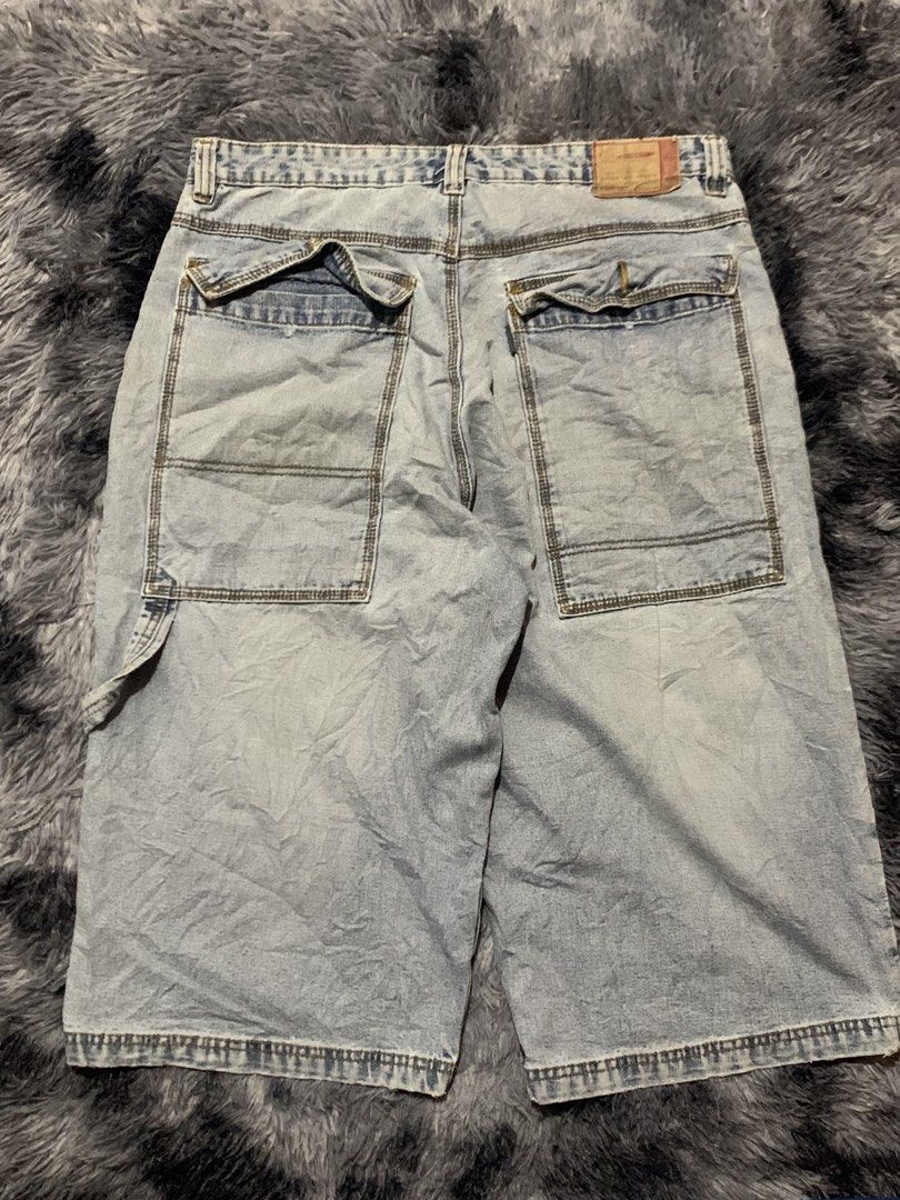 Chieftain Light Blue Denim Carpenter shorts size 34.5 (Category: Shorts) located in Cebu City. Submitted by johnbagzz (Listing ID 1469057278, Image 3). Description: - Brand: Chieftain - Style: Light wash denim cargo shorts for casual streetwear - Fit: Relaxed fit through the leg with a classic denim waistband and button closure - Features: Multiple utility pockets on the sides and back - Quality: Sturdy stitching with a branded tag on the inner w