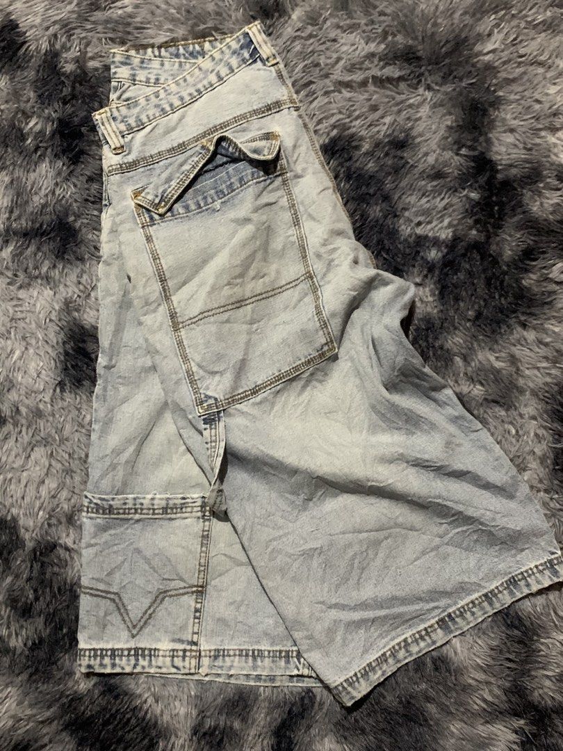 Chieftain Light Blue Denim Carpenter shorts size 34.5 (Category: Shorts) located in Cebu City. Submitted by johnbagzz (Listing ID 1469057278, Image 2). Description: - Brand: Chieftain - Style: Light wash denim cargo shorts for casual streetwear - Fit: Relaxed fit through the leg with a classic denim waistband and button closure - Features: Multiple utility pockets on the sides and back - Quality: Sturdy stitching with a branded tag on the inner w