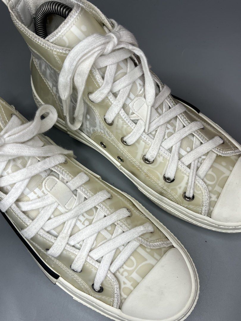 Christian Dior B23 High-Top Sneaker (Category: Sneakers & Footwear) located in Lala. Submitted by adrian.885 (Listing ID 1469131889, Image 3). Description: Christian Dior B23 High-Top Sneaker in an ivory, white, and beige Oblique motif with a transparent mesh and PVC panel design. OPEN FOR RESERVATION FOR 15 days Down payment 350 pesos CODED X SOLID MATERIAL NO ISSUE X GOOD AS NEW.