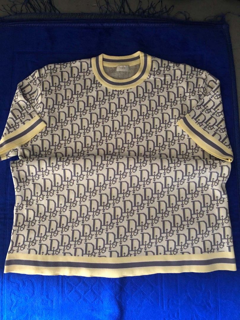 Christian Dior Monogram Knit & Pin T-shirt Bundle (Category: Shirts) located in Manila. Submitted by wonderboi80 (Listing ID 1468981373, Image 1). Description: - Authentic Dior tops bundle (Set of 2) - 100% cotton, Made in Italy - Top 1: All-over Dior monogram pattern with yellow and grey ribbed trim - Top 2: Plain white cotton with embroidered Dior lettering and safety pin graphic - Clean inner tags and clear branding throughout - Guaranteed hig
