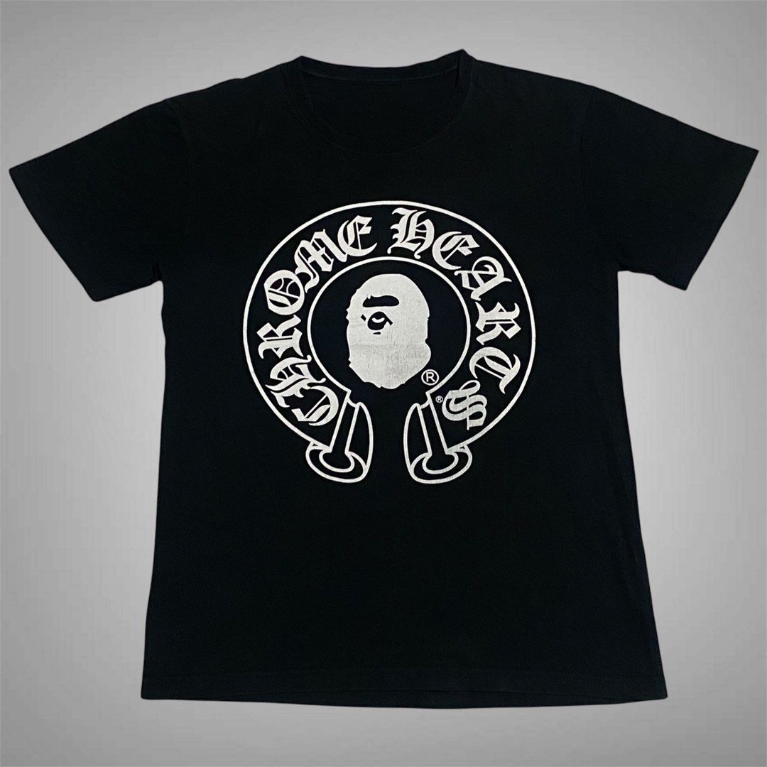 Chrome Heart x A Bathing Ape (Category: Shirts) located in Mabalacat. Submitted by stellargarments (Listing ID 1468975333, Image 2). Description: no tags Length : 25 Width : 19 Condition : 9/10 smooth pa tela very comfy & smooth on skin minimal hairline sa harap sa likod 5hairline lang medjo lukot pa po need wash fresh from bale color may vary due to lighting.