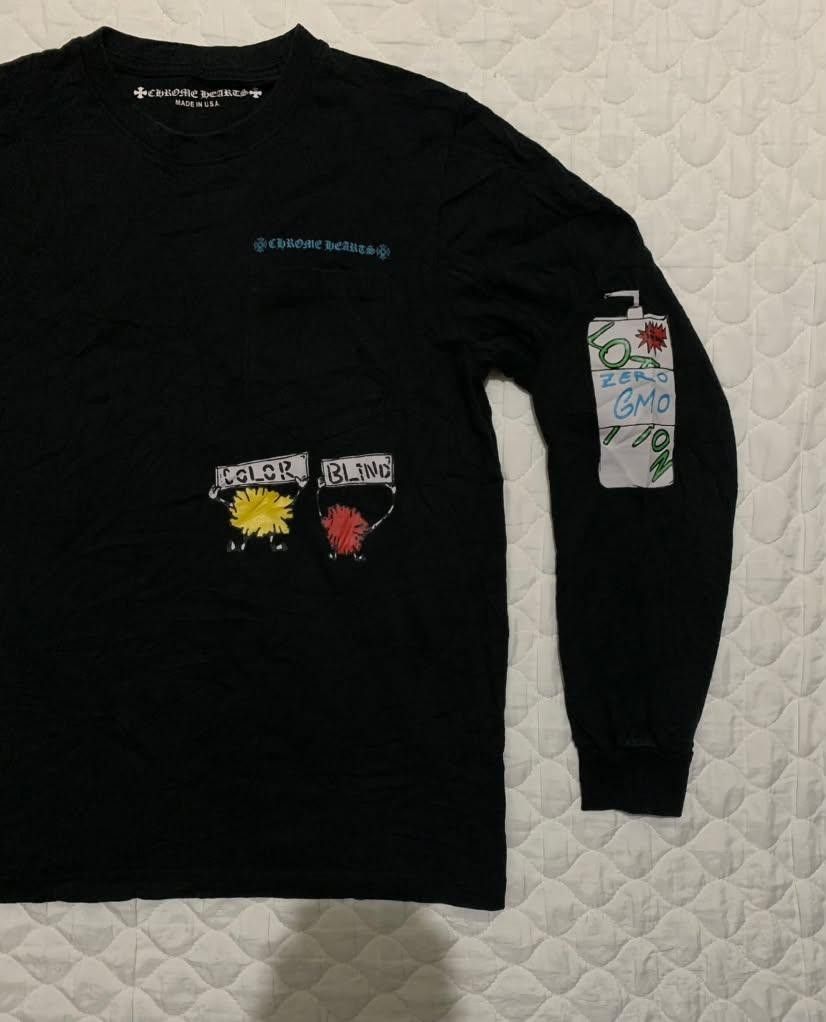 Chrome Hearts Color Blind Long Sleeve Tee Black (Category: Tshirts & Polo Shirts ) located in Manila. Submitted by vasteagle_347950 (Listing ID 1469080358, Image 3). Description: - Brand: Chrome Hearts - Color: Black - Fit: Standard fit, heavyweight cotton fabric - Details: Colorful graphic prints on front pocket, sleeves, and back with text accents - Construction: Ribbed crew neck and cuffs, Made in USA inner tag - Condition: Great streetwear co
