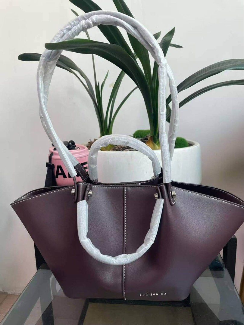 CHRSTY NG Bridget Tote Bag (Category: Tote Bags) located in Manila. Submitted by whimsy.finds (Listing ID 1469051859, Image 1). Description: dual collapsible short and long handle Free paperbag Payment first basis via Gcash / Maribank / Maya Ship via Lalamove / JNT *No rush shipping * Open for bulk order.