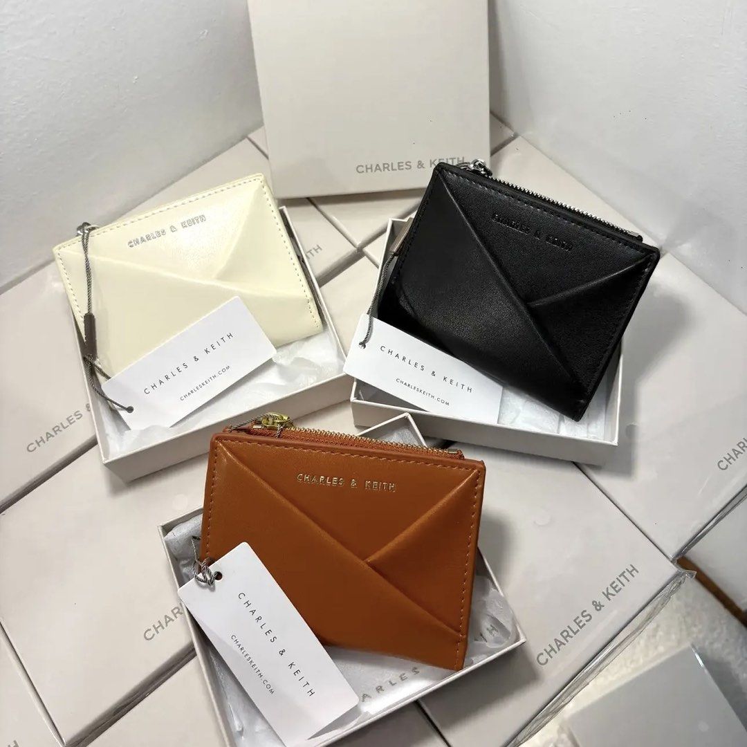 C&K Midori Geometric Small Wallet (Category: Wallets & Card holders) located in Bulacan. Submitted by mykakarizza (Listing ID 1469074262, Image 1). Description: NEW✨✨ ₱500 with box C&K Midori Geometric Small Wallet 1 Note Compartment(s) 1 Zip Compartment(s) 10 Card Slot(s) Width 11.3 cm Depth 2 cm Height 9 cm 📸 Actual pics! 🙋🏻‍♀️ ─── ✦ ─── ✦ ─── ✦ ─── ✦ ─── 🛍️ LOOKING FOR MORE RESELLERS 🛍️ ✨ Buy 3 pcs of ANY items — FREE SHIPPING NA!🚚 ✨ Buy