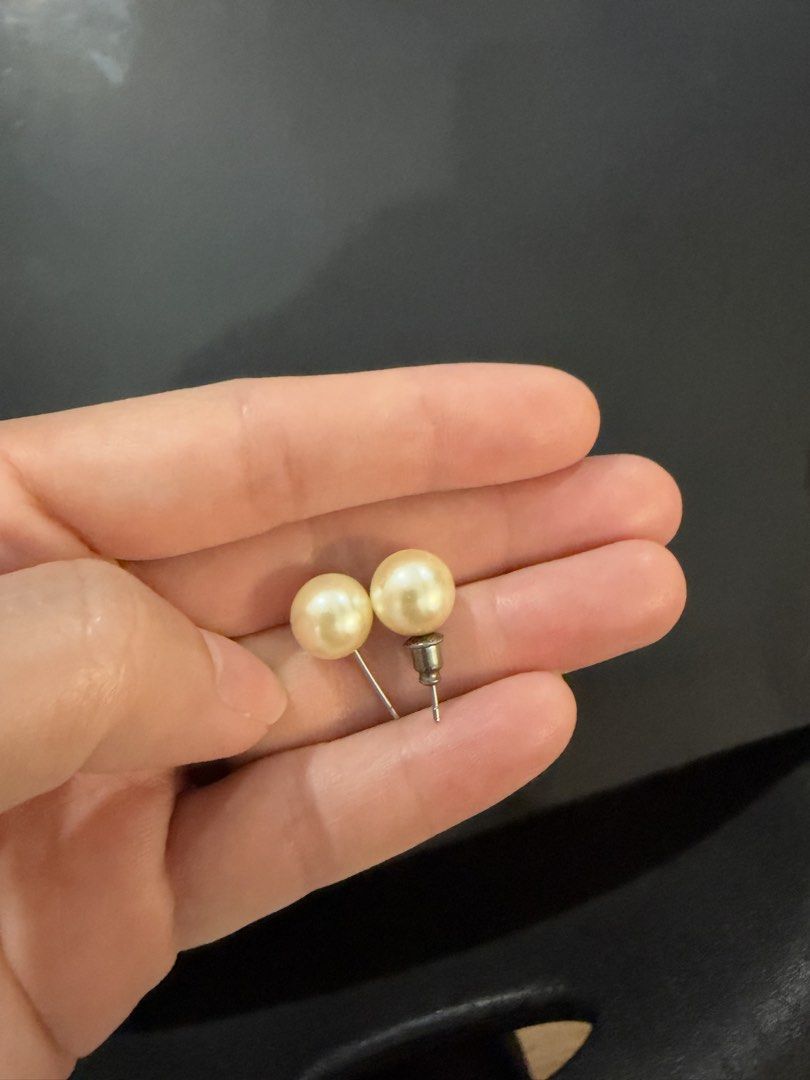 Classic faux pearl stud earrings (Category: Earrings) located in Manila. Submitted by garagesalebykoda (Listing ID 1469076006, Image 1). Description: - Style: Classic faux pearl stud earrings - Color: Creamy white - Condition: Clean, ready to ship - Details: Standard metal posts (one includes back piece) - Versatility: Matches almost any outfit for daily wear.