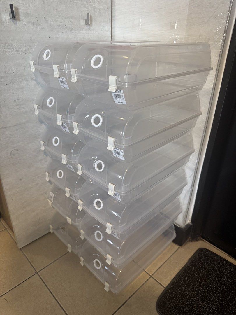 Clear Plastic Stackable Shoe Storage Boxes Set (Category: Storage Boxes & Baskets) located in Manila. Submitted by dondonc1026 (Listing ID 1469159117, Image 2). Description: SHOE BOX 12 pcs 14 x 8 inches Can fit unisex shoes - Clear stackable design: Easily see and find your favorite sneakers at a glance - Secure closure: White plastic latches keep lids firmly in place - Dust-free protection: Keeps your kicks clean and fresh - Space-saving tower 